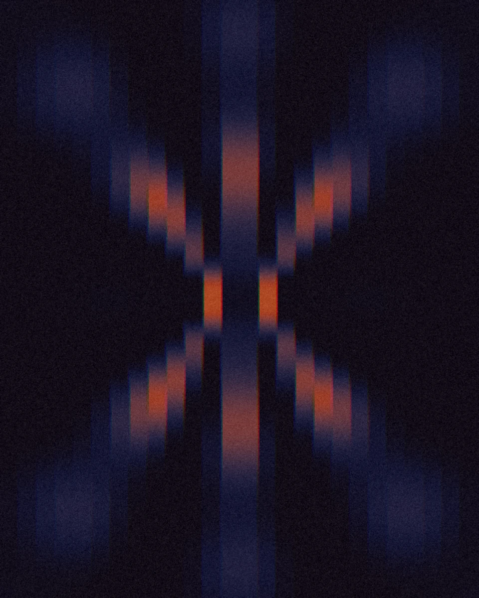 Two-source interference read through 26 vertical columns: a dark X of blue and orange steps on near black, with a slight red and blue split.